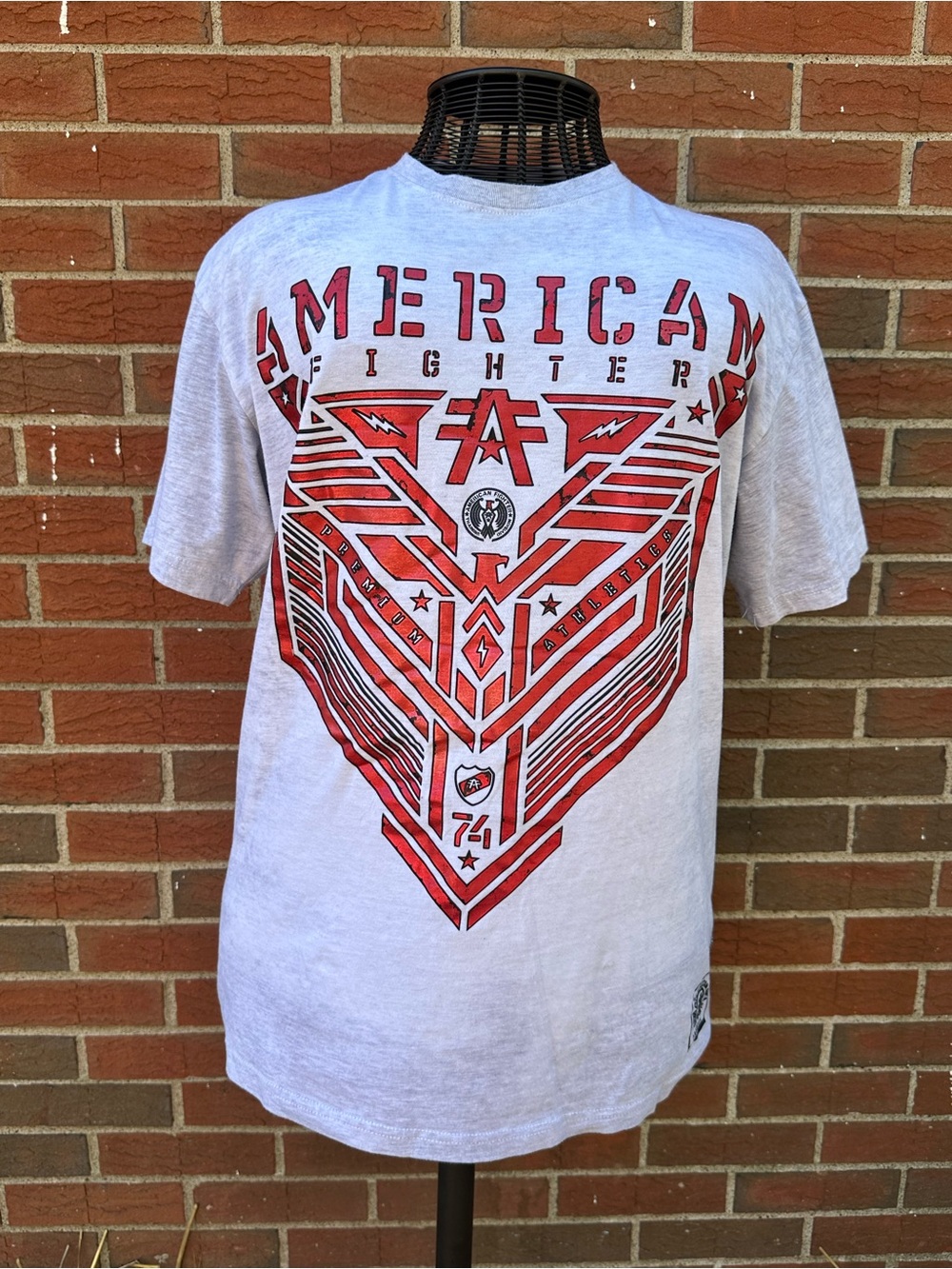 American Fighter Gray Tee with Red Geometric Front Graphic